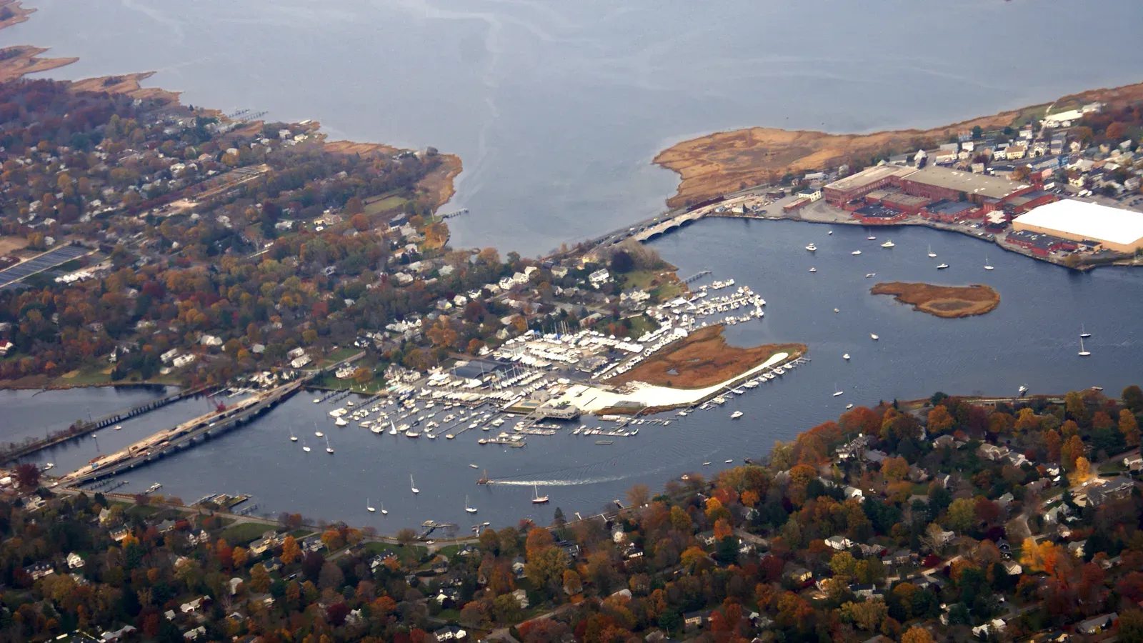 Aerial view of Barrington's harbor, marina, and tree-lined village, Barrington, Rhode Island