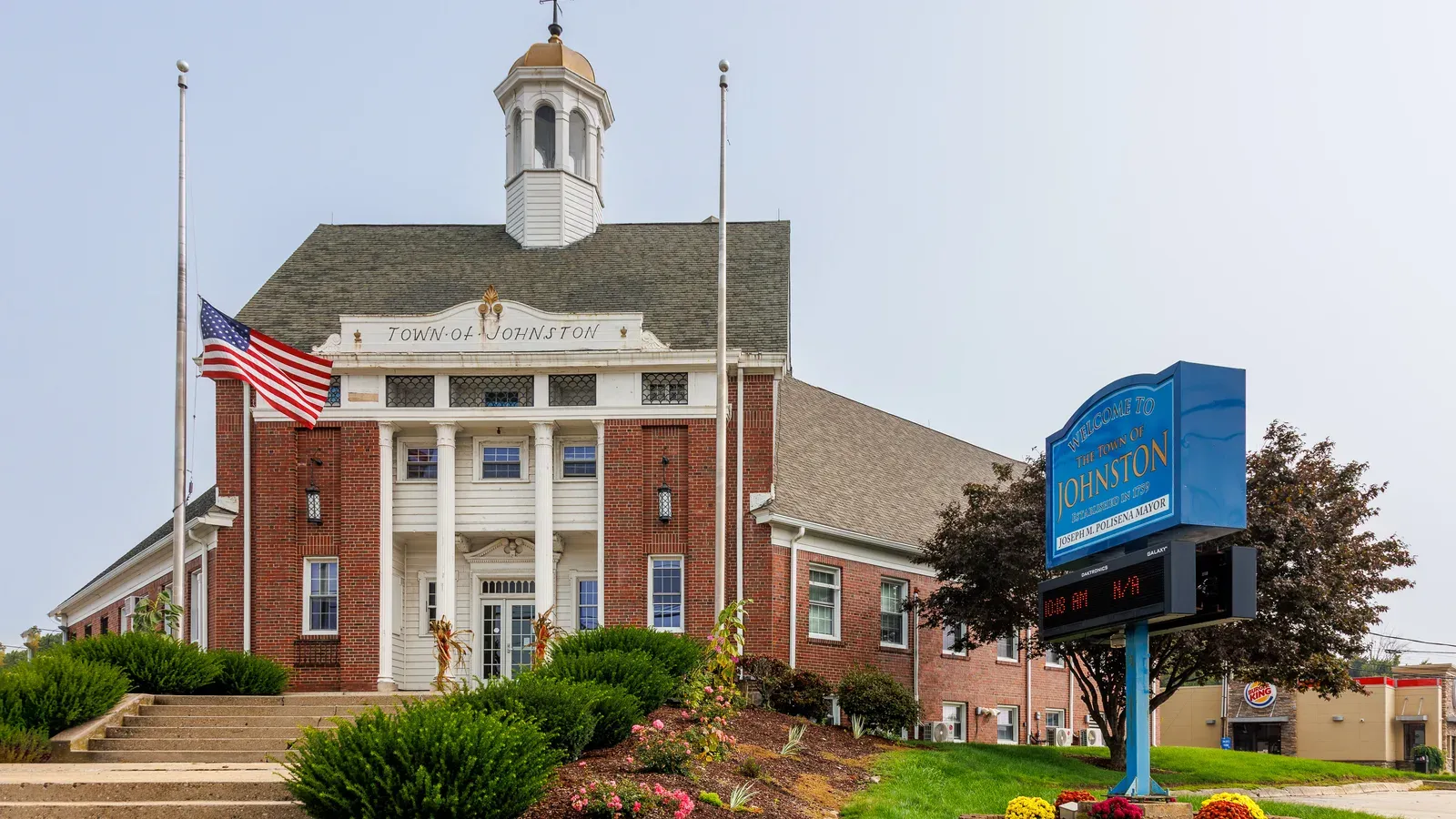 The brick Town of Johnston town hall with its white portico and cupola, Johnston, Rhode Island