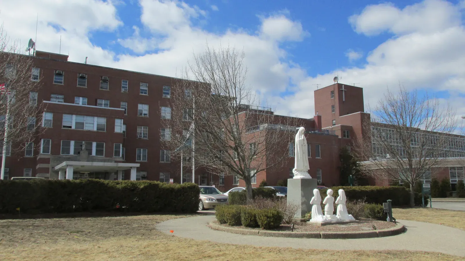 The brick Our Lady of Fatima Hospital campus with its Fatima statue, North Providence, Rhode Island