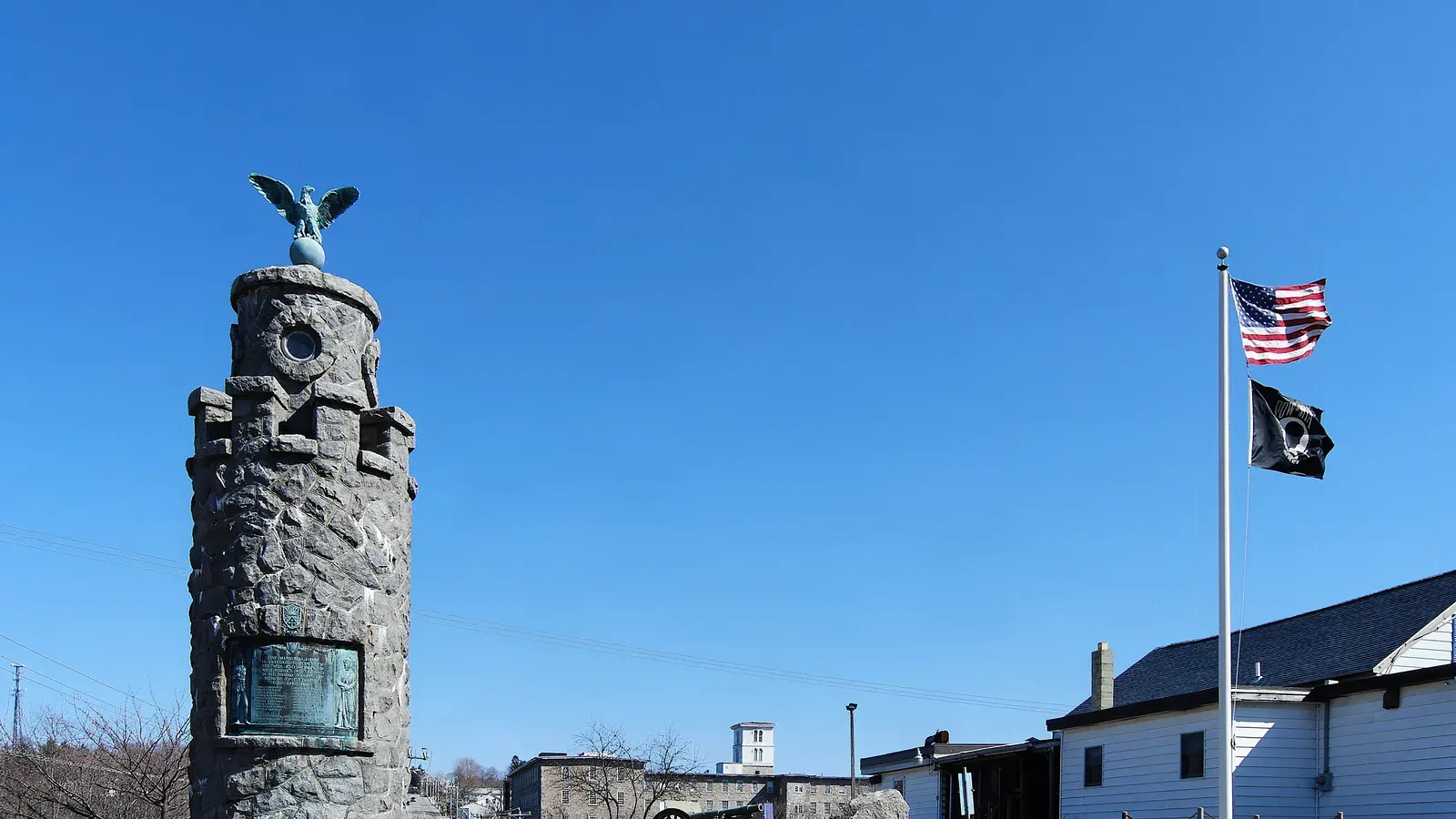 The West Warwick war memorial with its eagle-topped granite column, West Warwick, Rhode Island